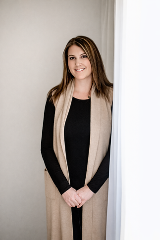 Relaxed portrait with white curtain.png
