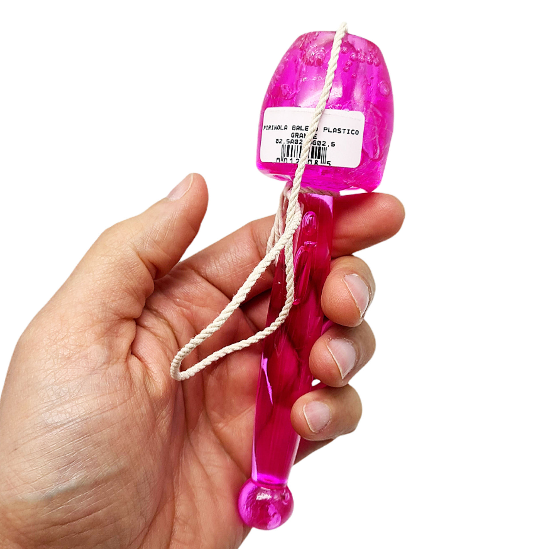 Mano sosteniendo juguete rosa con cuerda