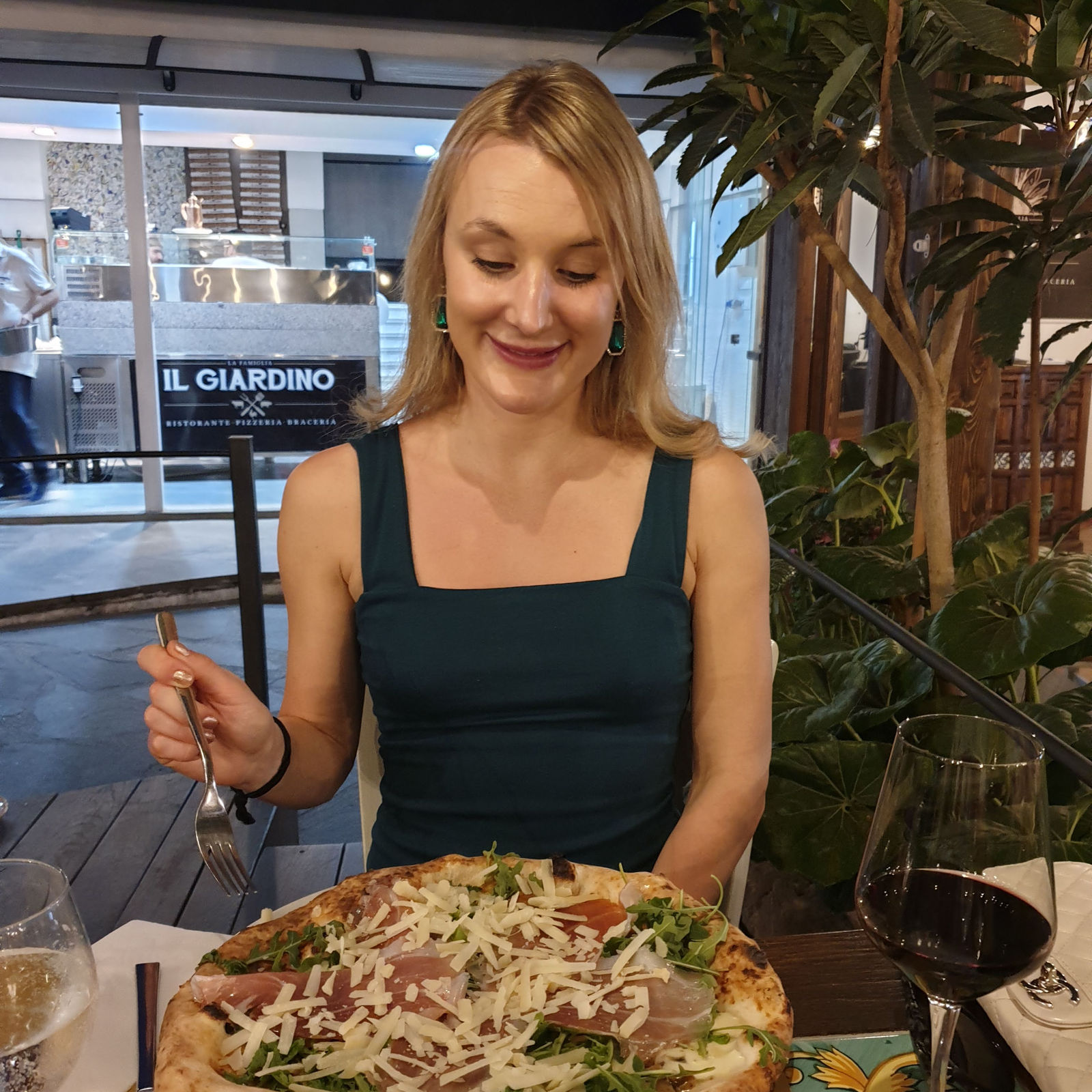 Eating pizza at Il Giardino in Italy