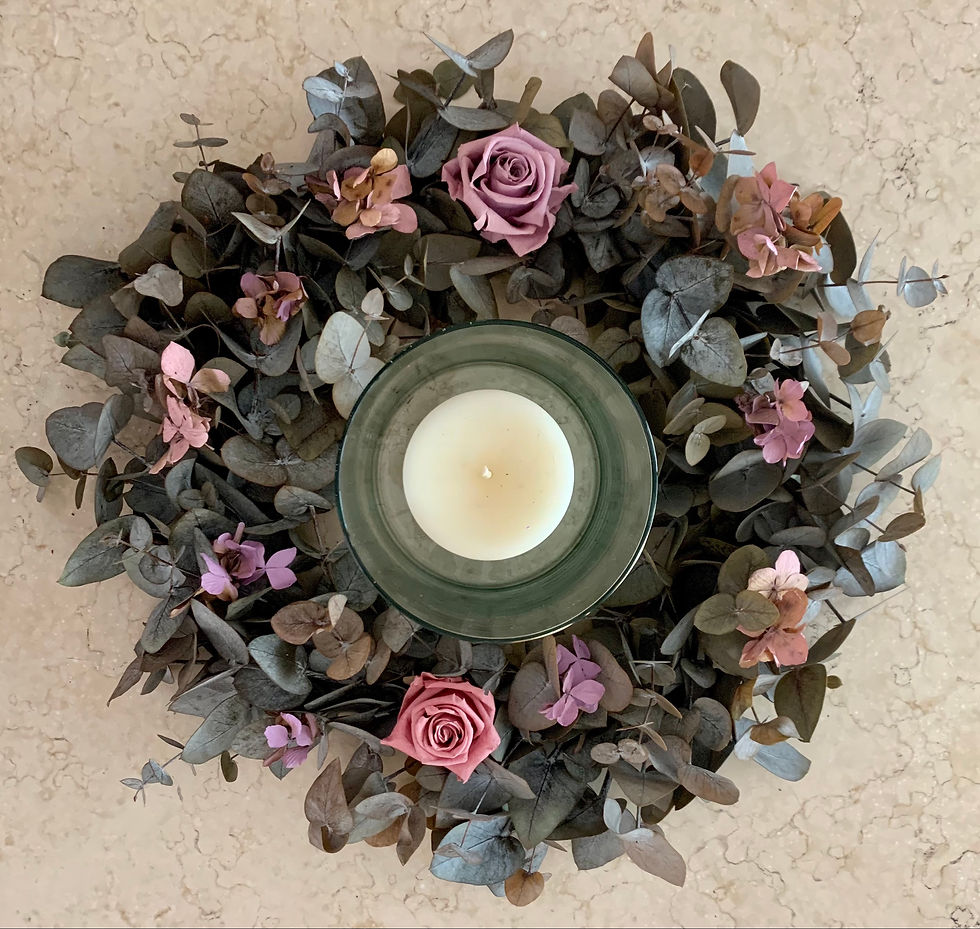 Corona primavera 2 rosas dólar con vela.