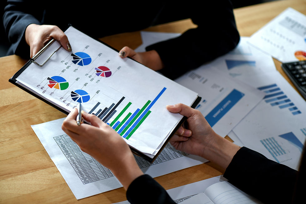 business-professionals-reviewing-charts-and-data-a-2026-09-21-11-13-24-utc.jpg