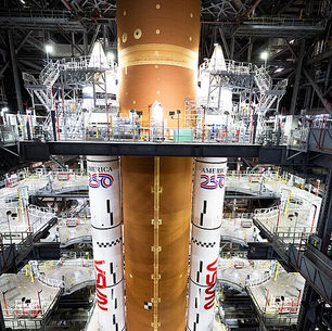 The Artemis II Space Launch System rocket in its hanger