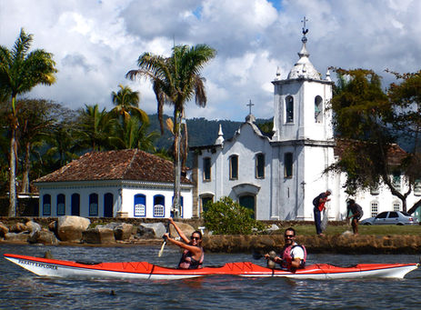Leaving colonial Paraty in sea kayaks.