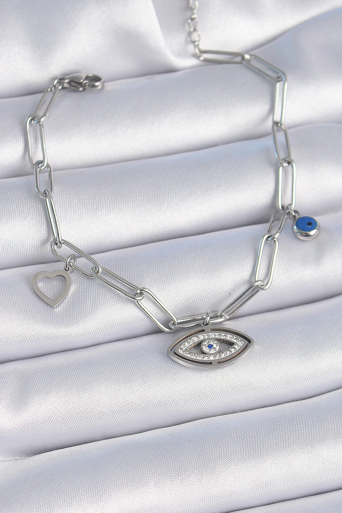 Çelik Gümüş Renk Zirkon Taşlı Göz Figür Kalp Detay Bileklik