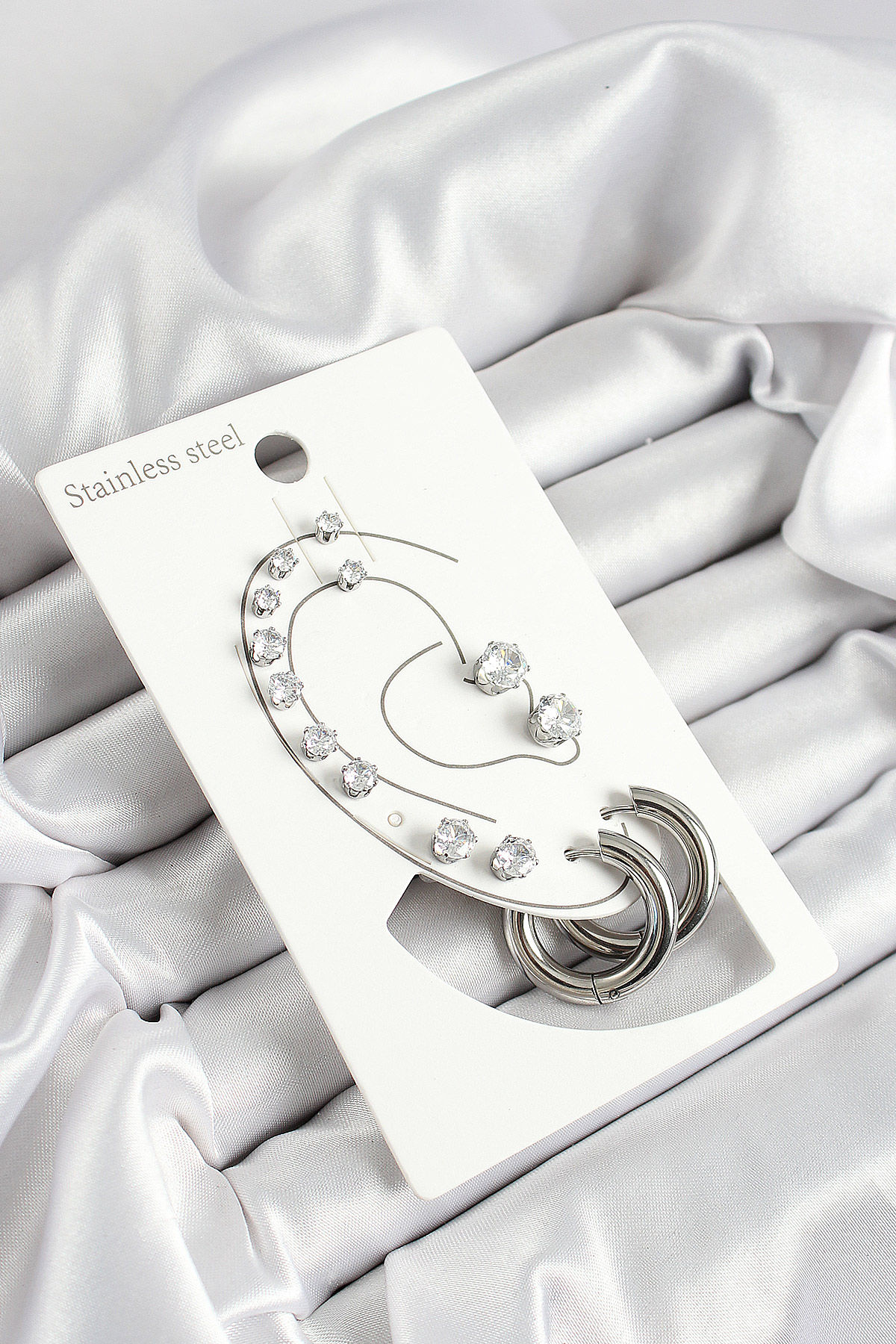 Çelik Halka Figürlü Ve Zirkon Taşlı Gümüş Renk 7'li Çift Küpe Set