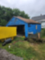 Garage demolition before debris hauling in Mishawaka Indiana