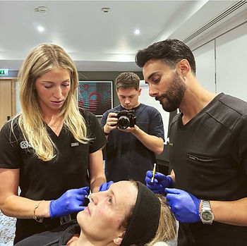 Sydney Lambert, FNP-BC (left), with Dr. Zack Ally (right) at the Sculpt Clinic in London