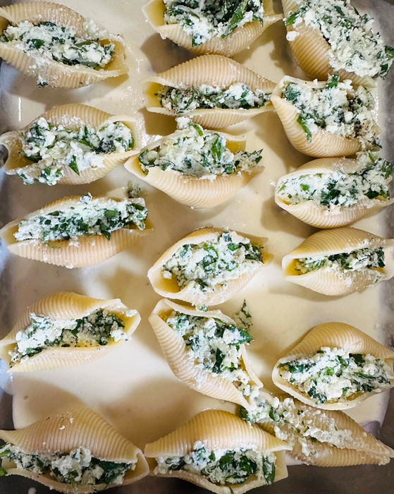 Fresh pasta shells filled with a creamy ricotta and spinach filling