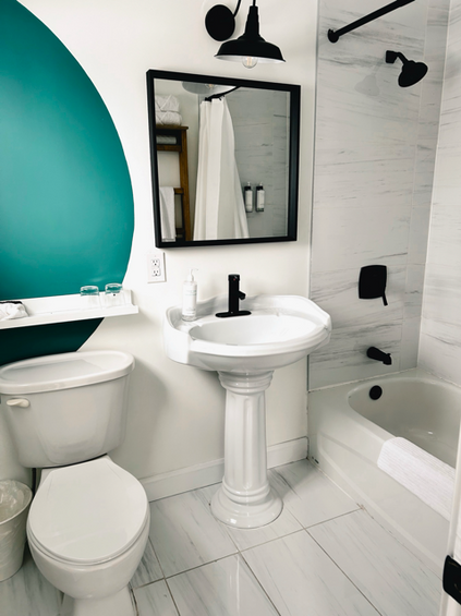 bathroom in the At The Beach queen room in the marmalade motel