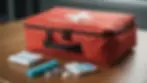 Close-up view of a first aid kit on a table