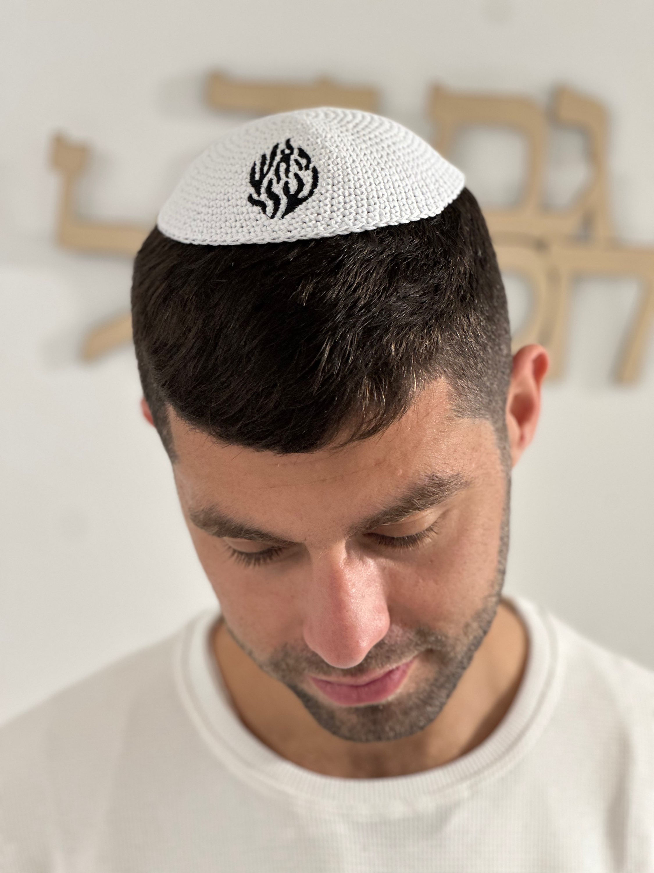 Knitted cap embroidered my fire