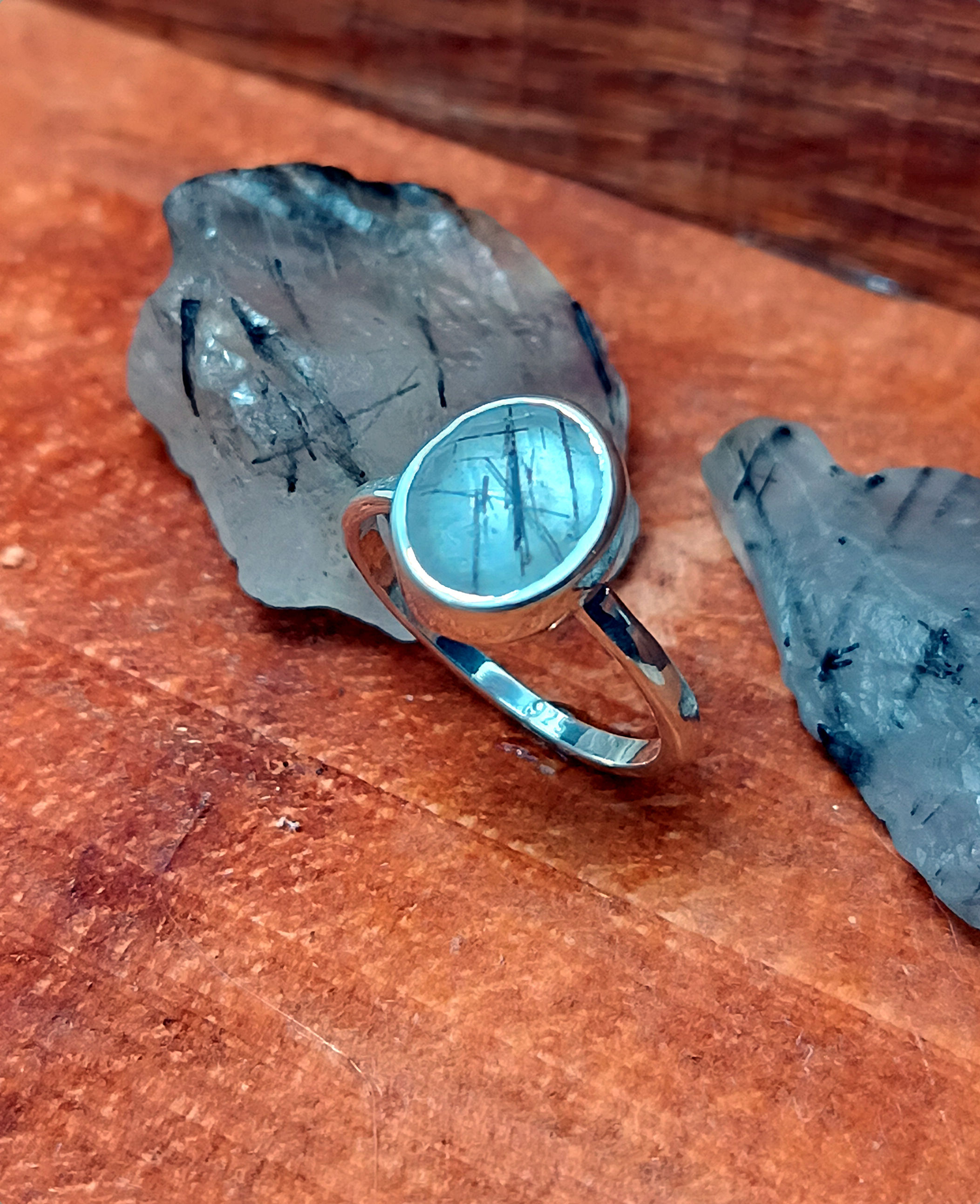 Sterling silver ring with tourmalinated quartz.