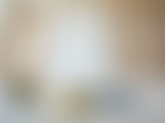 A workspace featuring construction tools and a tape measure, highlighting preparations for framing and drywall installation.