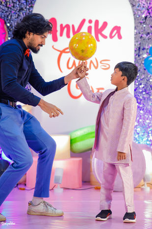 magic show in first birthday by lensaction baby photography