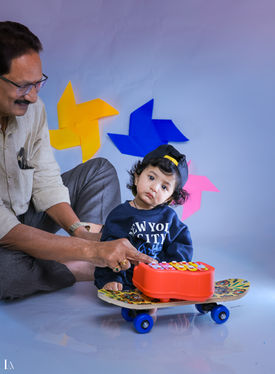 Fans theme baby photoshoot in Vizag by LensAction Photography