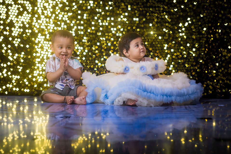 Double the smiles, double the joy! Celebrate your twin babies’ first birthday with a heartwarming and fun-filled photoshoot in Vizag. At LensAction Photography, we specialize in capturing the unique bond between twins through custom themes, twin props, and coordinated outfits. Whether it’s a cake smash, traditional setup, or a pastel theme, our studio brings your twin babies’ 1-year memories to life with creativity and care.