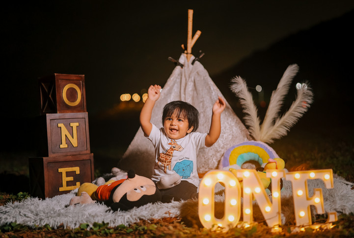 Outdoor theme-based pre-birthday photoshoot of a one-year-old baby in Vizag by LensAction Photography