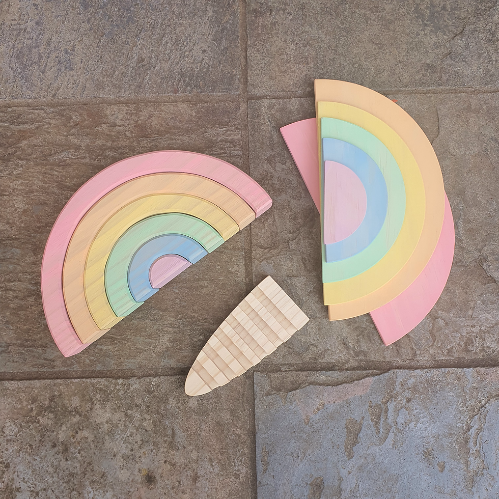 Thumbnail: Wooden rainbow stacker in pastel colors, creative toy on tiled surface.