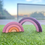 Thumbnail: Wooden rainbow toys sit on green grass in natural outdoor lighting.