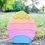 Thumbnail: Stacked colorful Easter egg toy on grass, Serenitoys Easter Egg Stacker, outdoor scene.