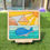 Thumbnail: Wooden whale puzzle, boat and sun design, displayed on a wooden stand. Serenitoys