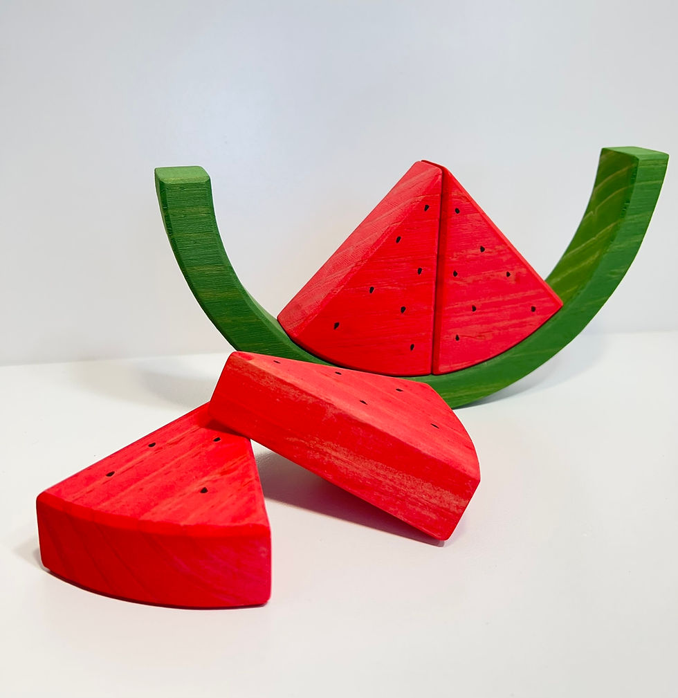 Thumbnail: Wooden watermelon stacker toy on white. Serenitoys Watermelon Stacker and other pieces.
