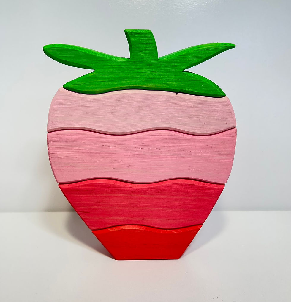 Thumbnail: Stacked strawberry toy in shades of red and pink, Serenitoys Strawberry Stacker.