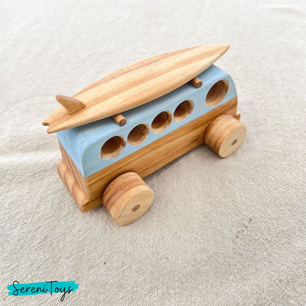 Thumbnail: Wooden toy bus with surfboard Serenitoys Full Moon Semis - Monochrome on a surface Serenitoys
