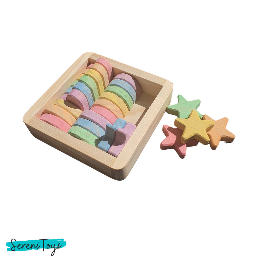 Wooden stacking toys in a wooden tray with star shapes Serenitoys