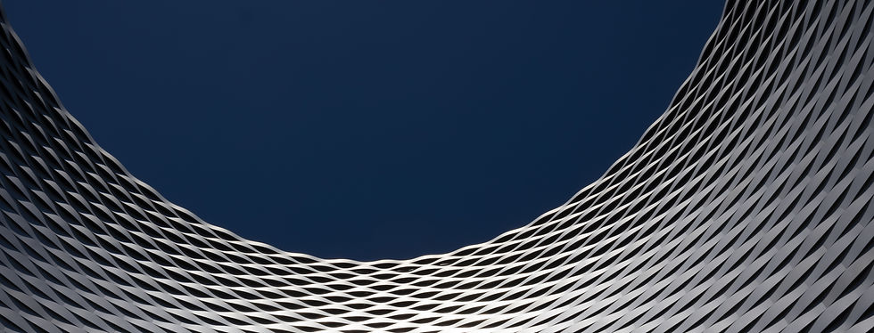 Modern building in glass and chrome, representing the dissertation construction process.