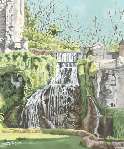 Waterfall in the gardens of Villa d'Este surrounded by moss and ferns