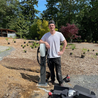 Electrician Installing Cable Management for Ev Unit