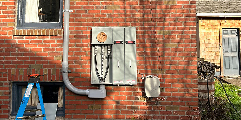 Close-up view of an electrician's tools on a workbench