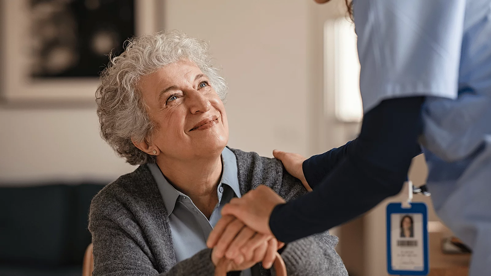 Registered nurse providing compassionate skilled nursing care to an older adult at home, offering support, reassurance, and personalized medical care to promote safe recovery and independence.
