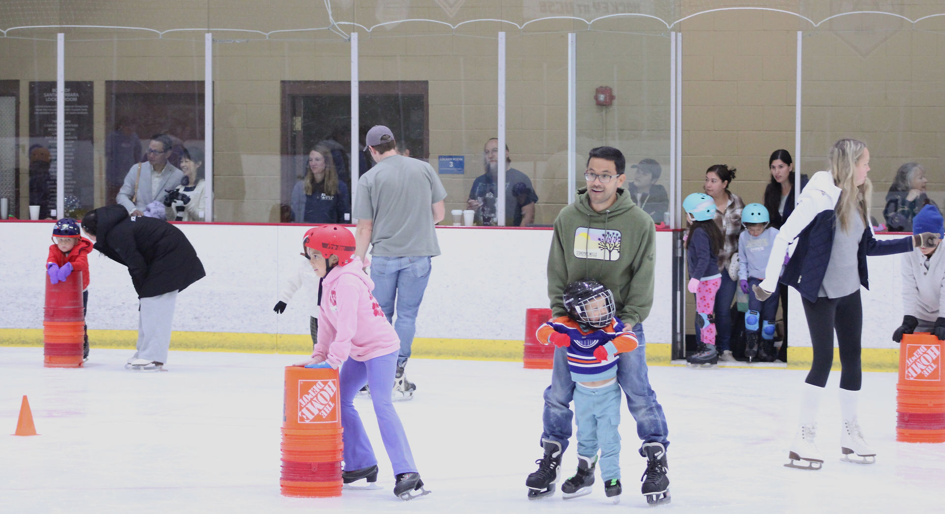 New skaters of all ages take the ice for their free lesson at Ice in Paradise's Skating Spree