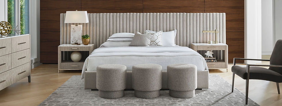 Bedroom with bed, nightstands, and benches; interior design services. Pompano Furniture and Design