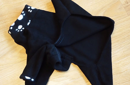 Can be made with velcro on sides of onesie