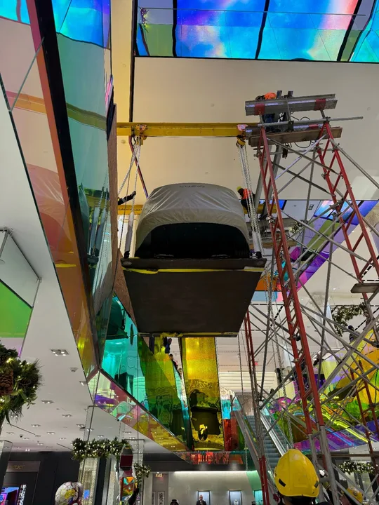 Lucid vehicle within the support and scaffolding structure at Saks Fifth Avenue
