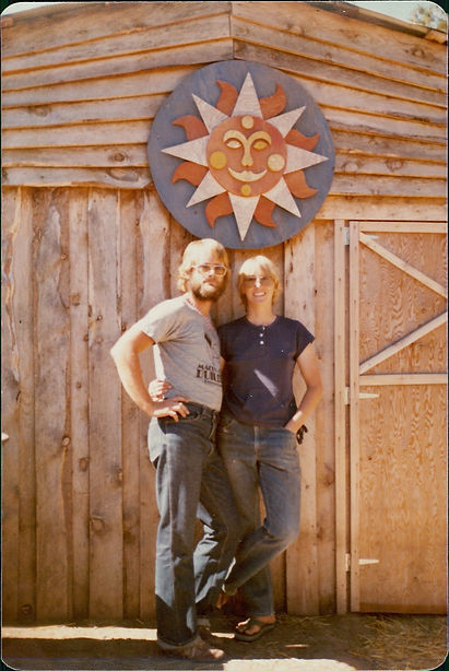 Tom and Penny in front of new barn.jpeg