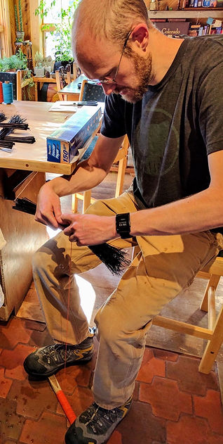 Aaron making a first broom.jpeg