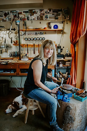April Ottey Jewelry Artist woking in her studio