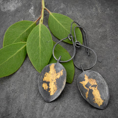 leaf with gold earrings