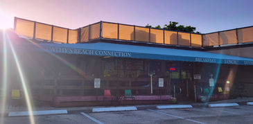 Cathy's Beach Connection outdoor dining at sunset