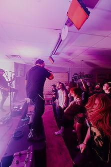 storm ruby singer of stories through storms embracing a crowd in longview texas