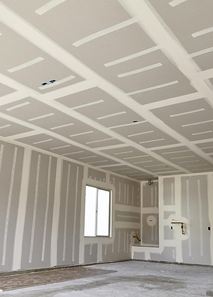 homeguide-room-with-tape-mud-drywall-ready-for-finishing.jpg