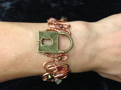 2014 copper cuff with lock on hand