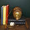 Thumbnail: A unique table lamp with turned wooden body and brass accents