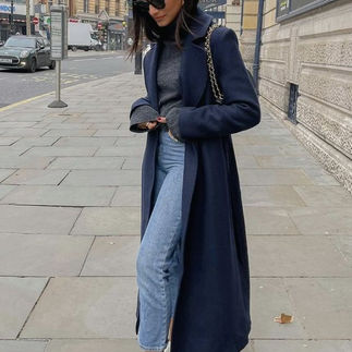Woman wearing midnight blue jacket