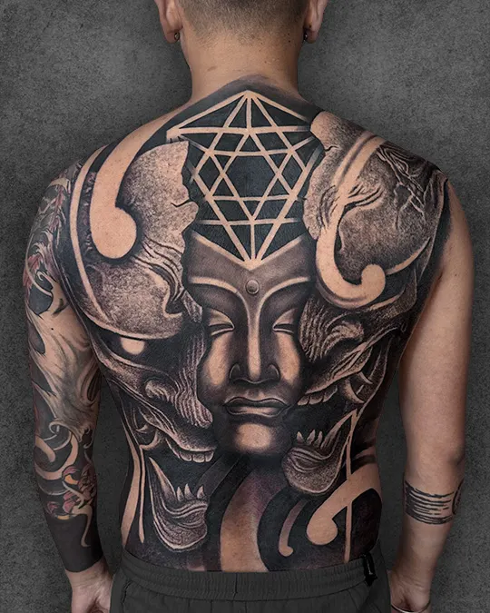 dualism buddha and hannya mask blackwork geometry tattoo