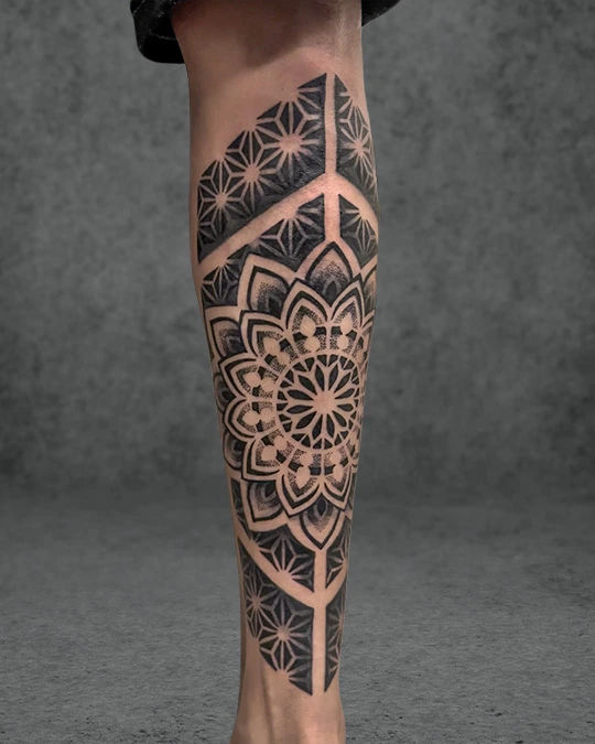 mandala with dotwork shading  on leg tattoo